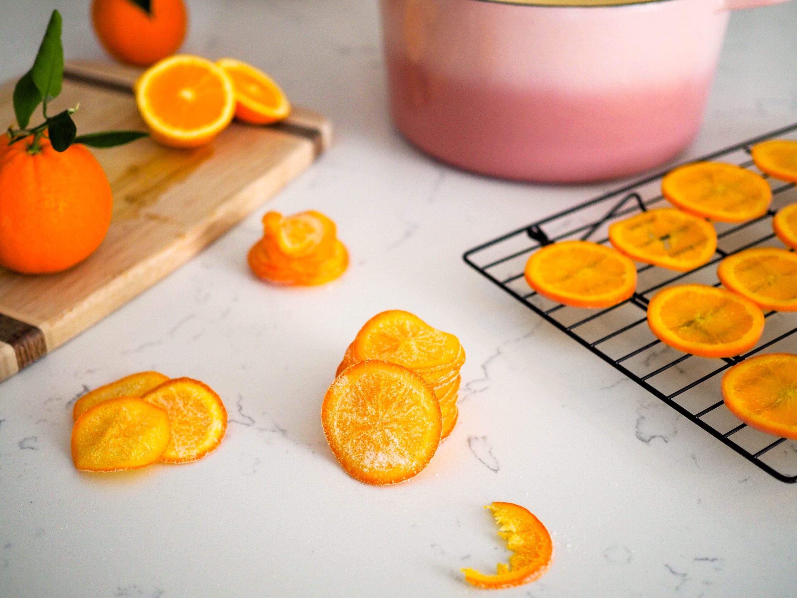 A stack of candied orange slices, with one missing a bite.
