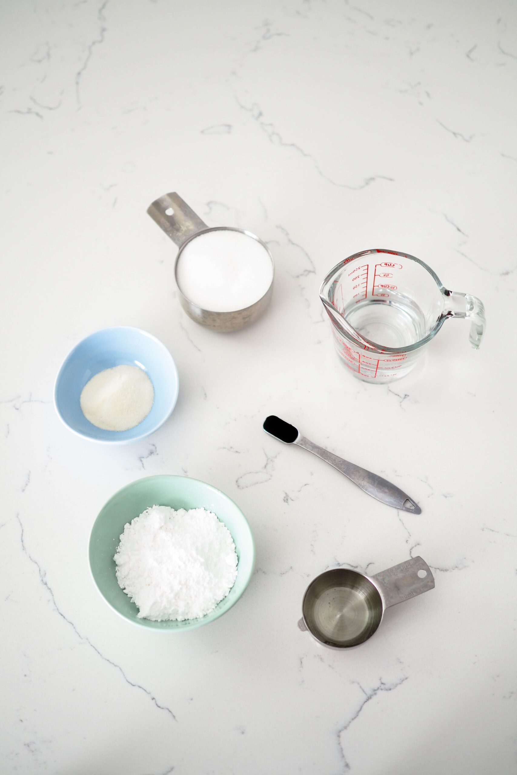 Six ingredients used to make homemade marshmallows.