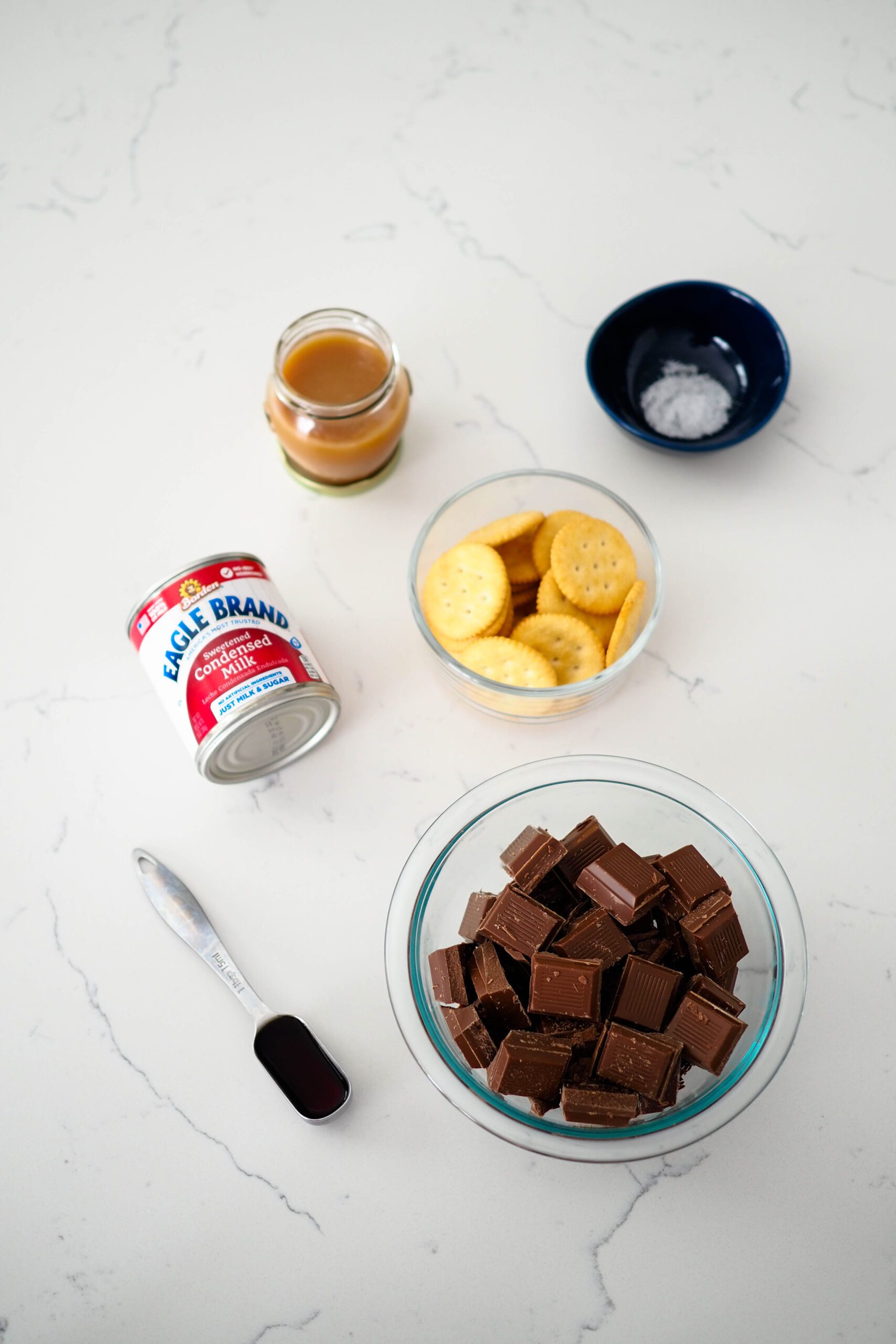The ingredients for ritzy fudge laid out on a countertop.