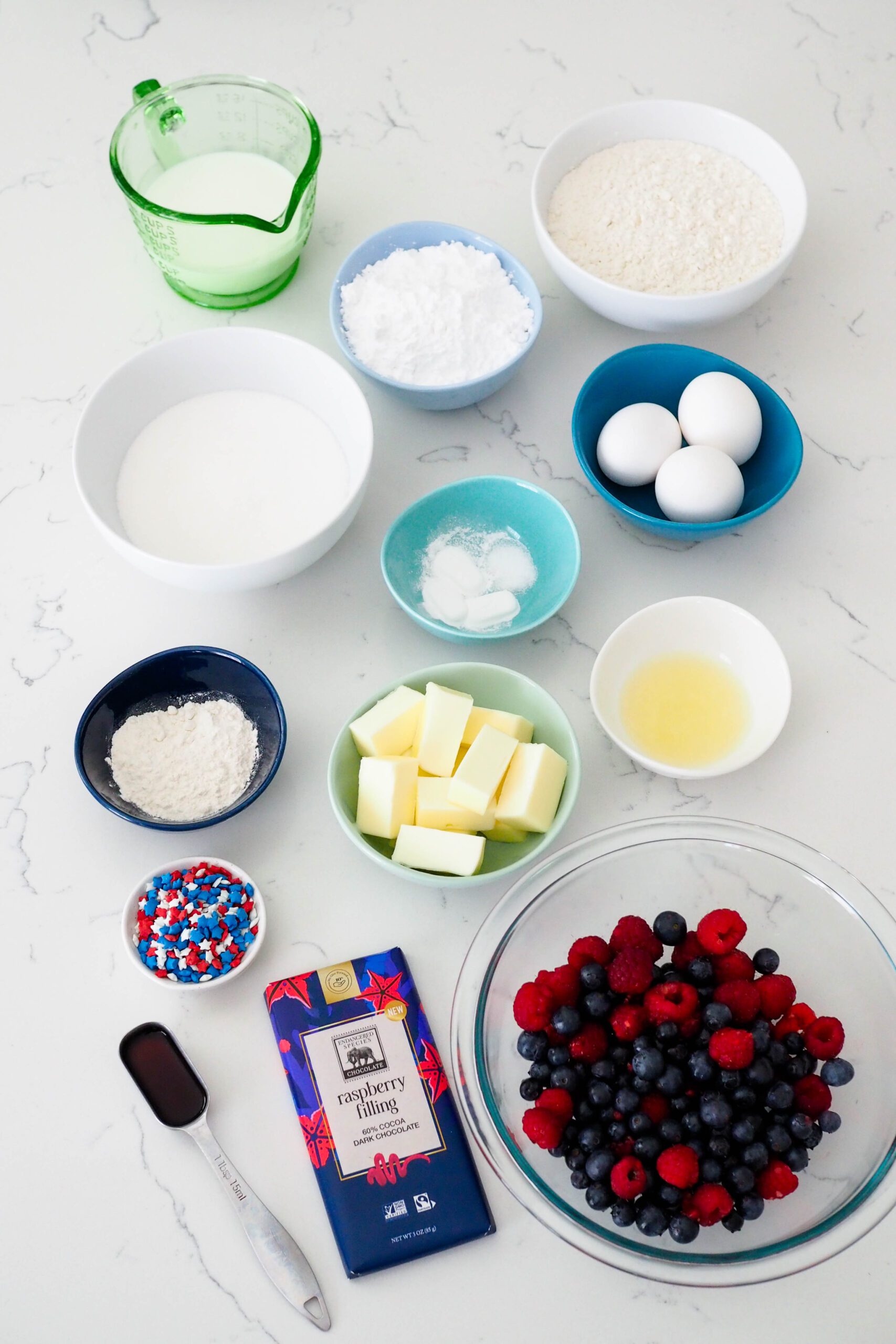 Ingredients for berry Bundt cake on a counter.