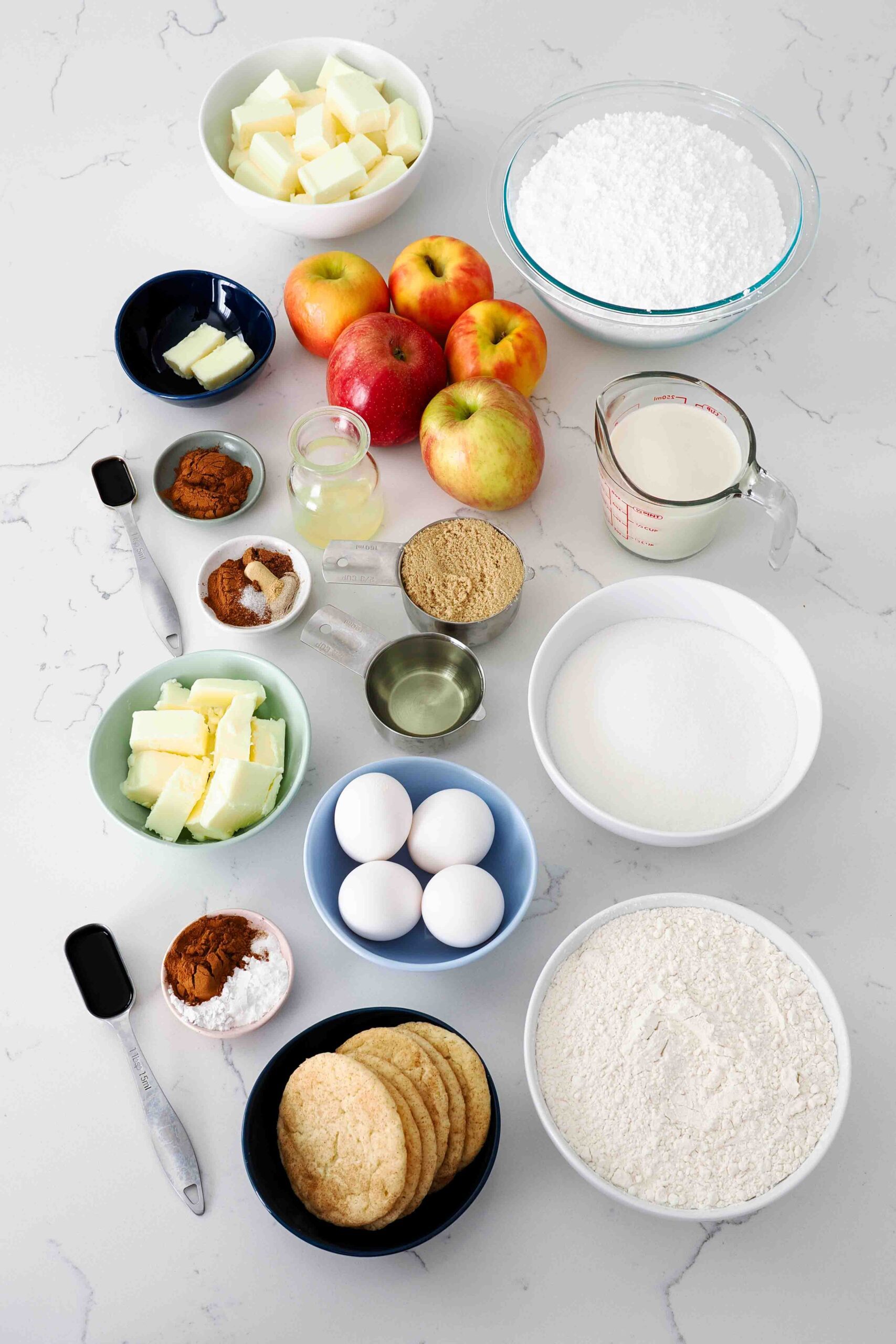 A collection of ingredients needed to make apple snickerdoodle layer cake.