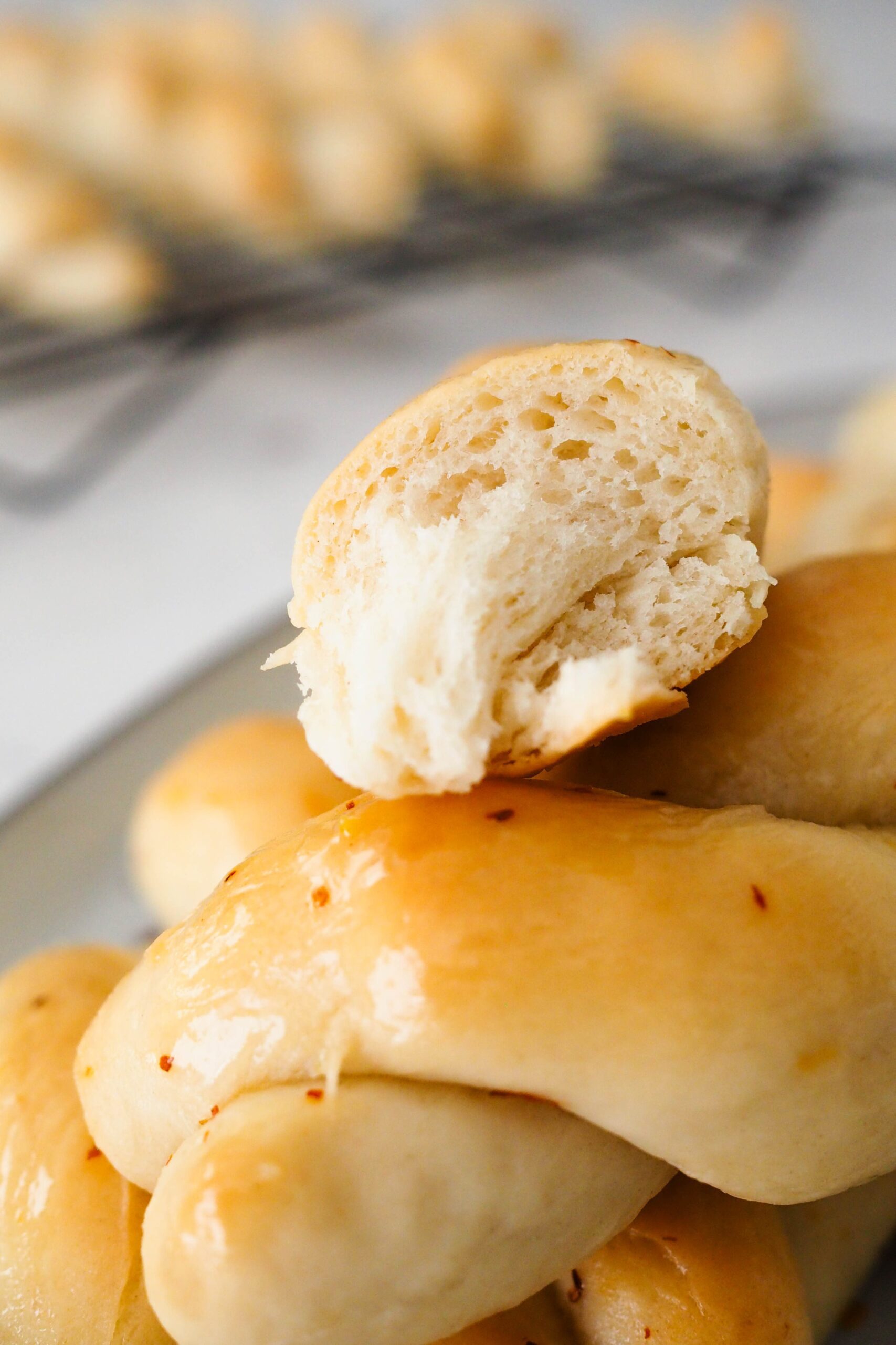 A closeup of the inside of a twisted garlic breadstick.