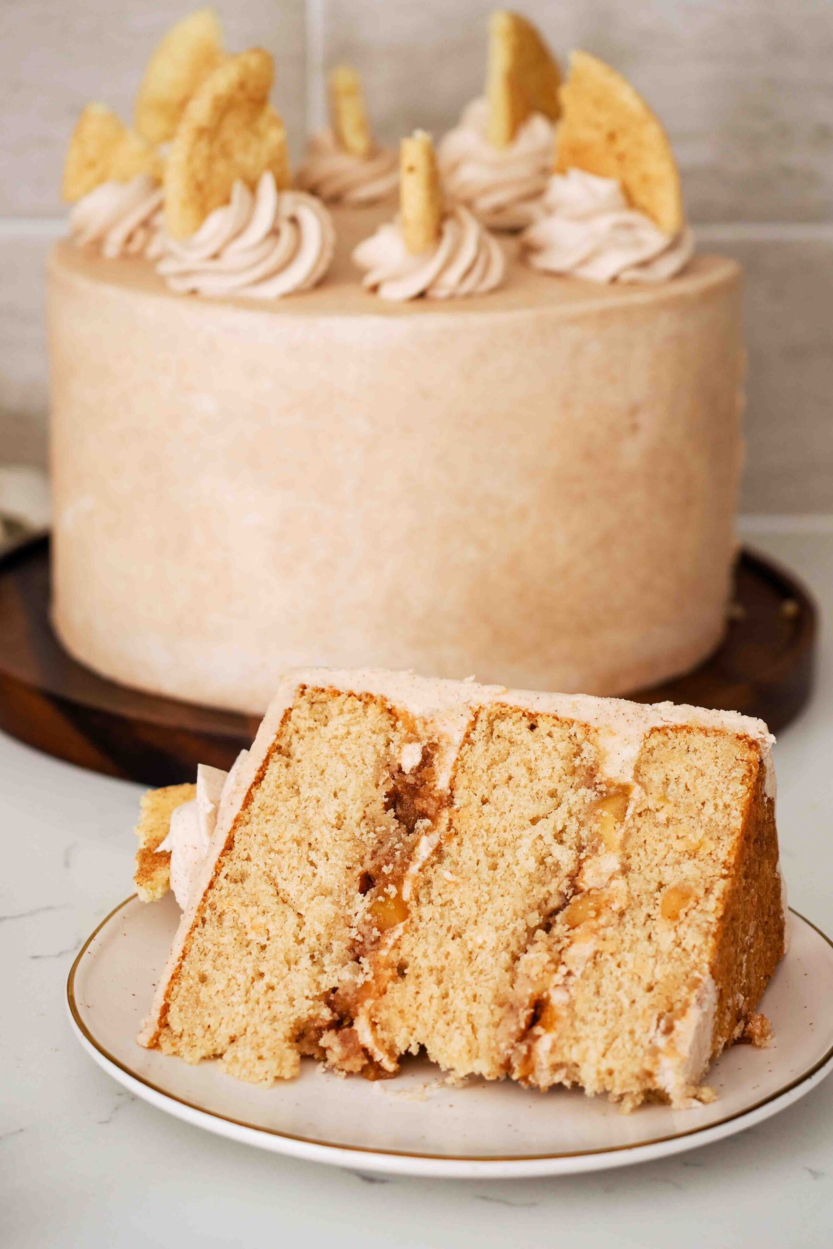 A large slice of apple snickerdoodle cake on a plate.