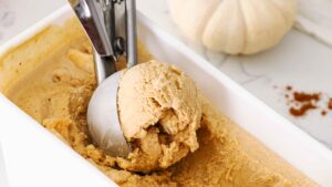 A scoop of homemade pumpkin pie ice cream.