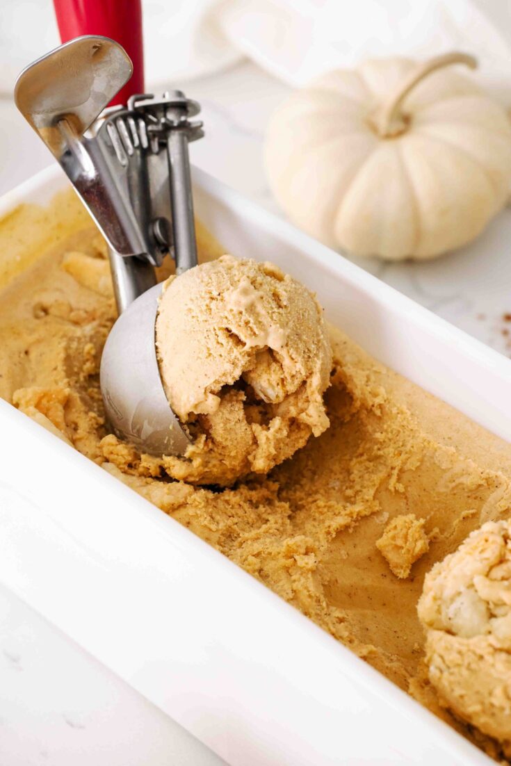A scoop of homemade pumpkin pie ice cream.