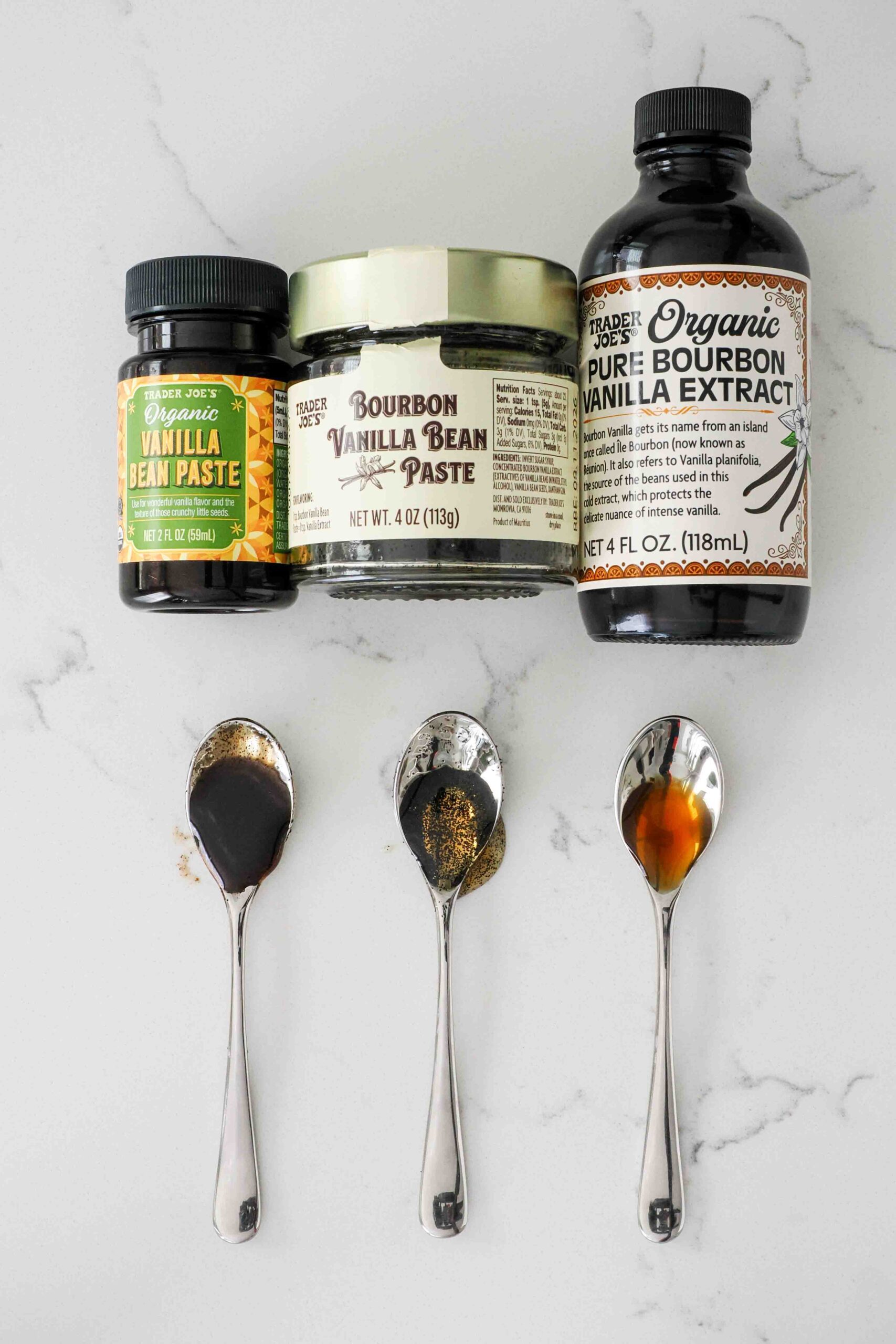 Three Trader Joe's vanilla products side by side, with product in coffee spoons.