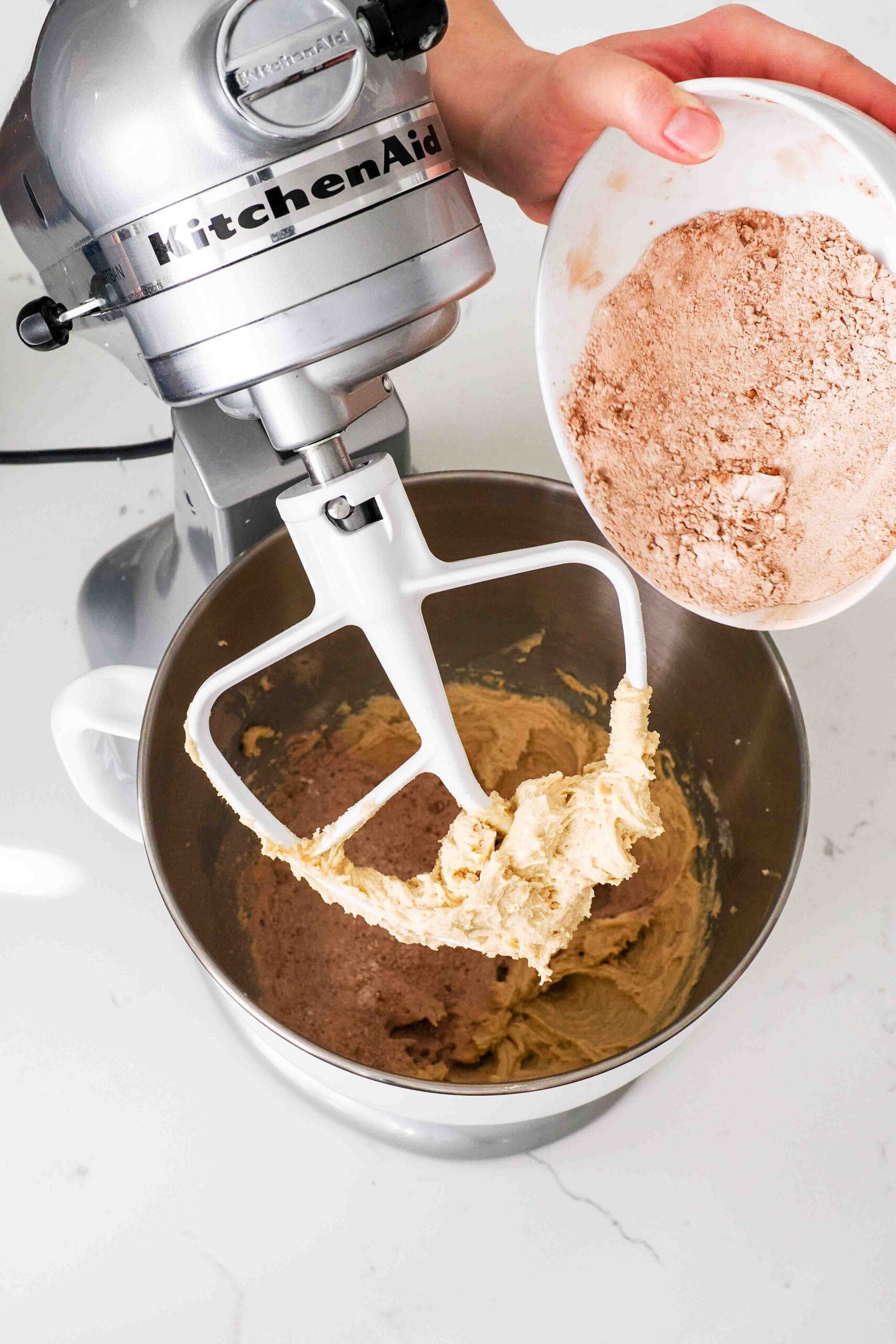Dry ingredients are added to we