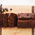 An overhead image of double chocolate banana bread on a cutting board.