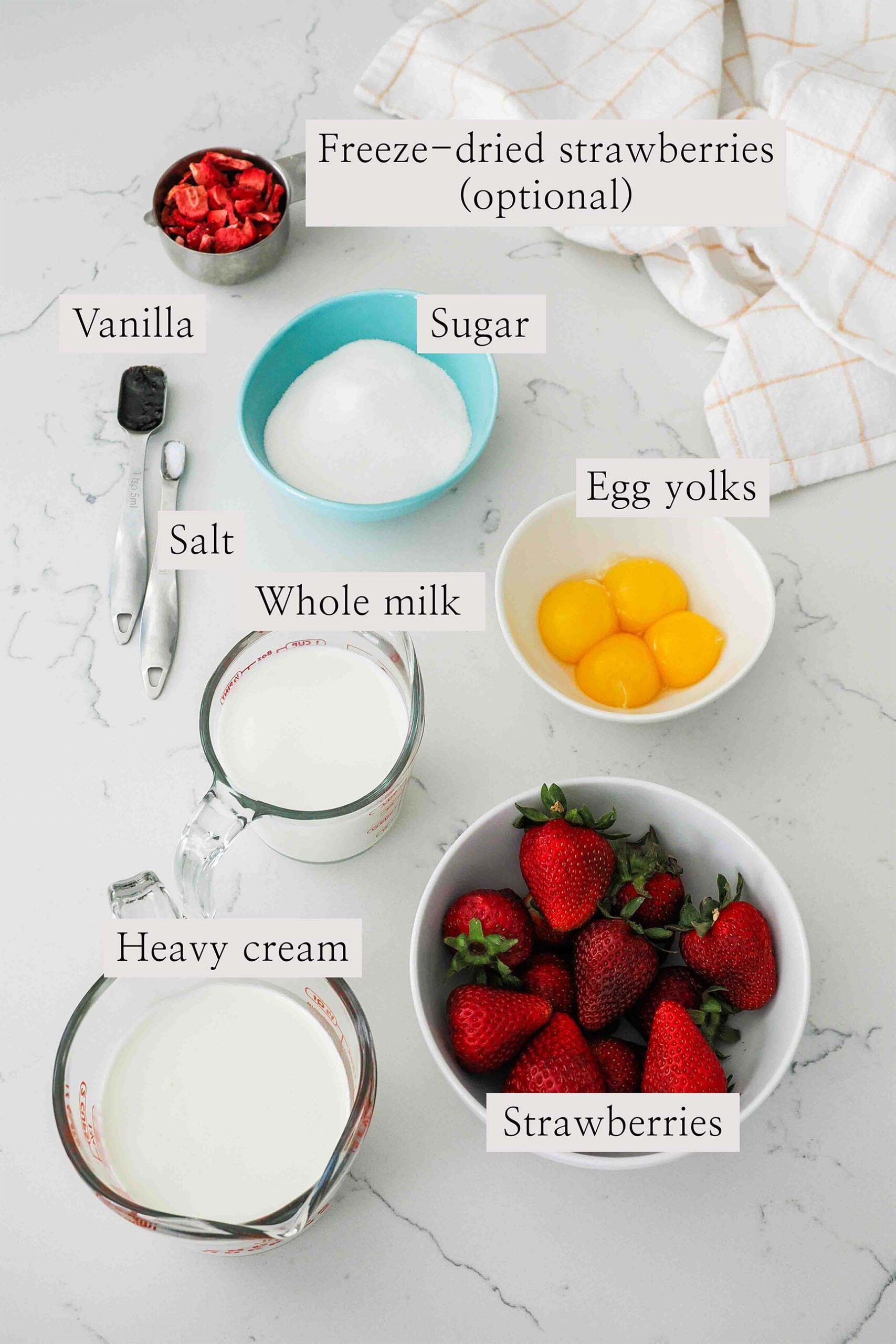 Ingredients needed to make strawberry frozen custard.