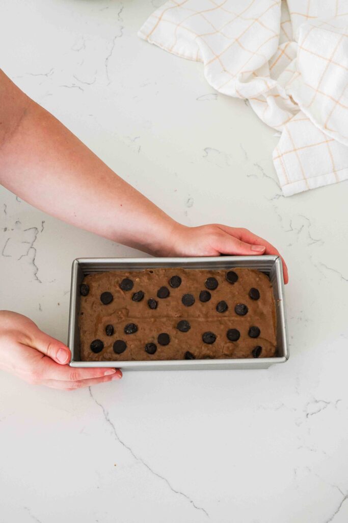 Unbaked double chocolate banana bread in a loaf pan.