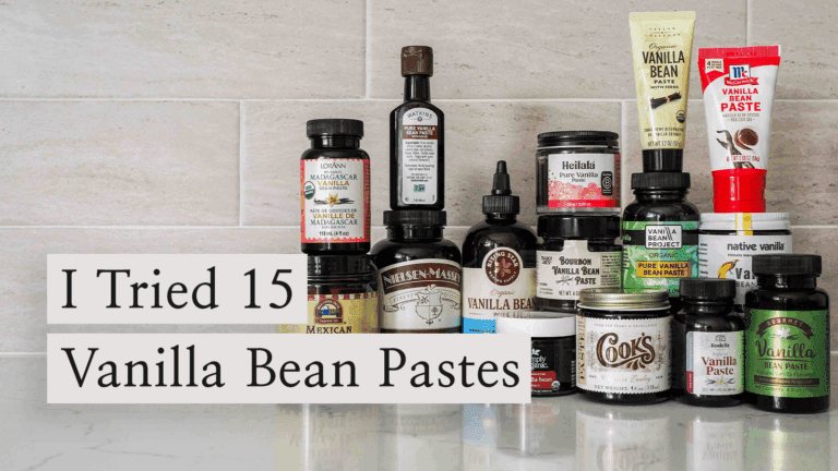 Vanilla bean paste bottles on a quartz counter.