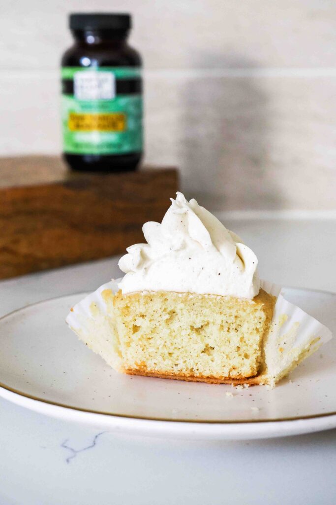 Half of a vanilla bean cupcake.