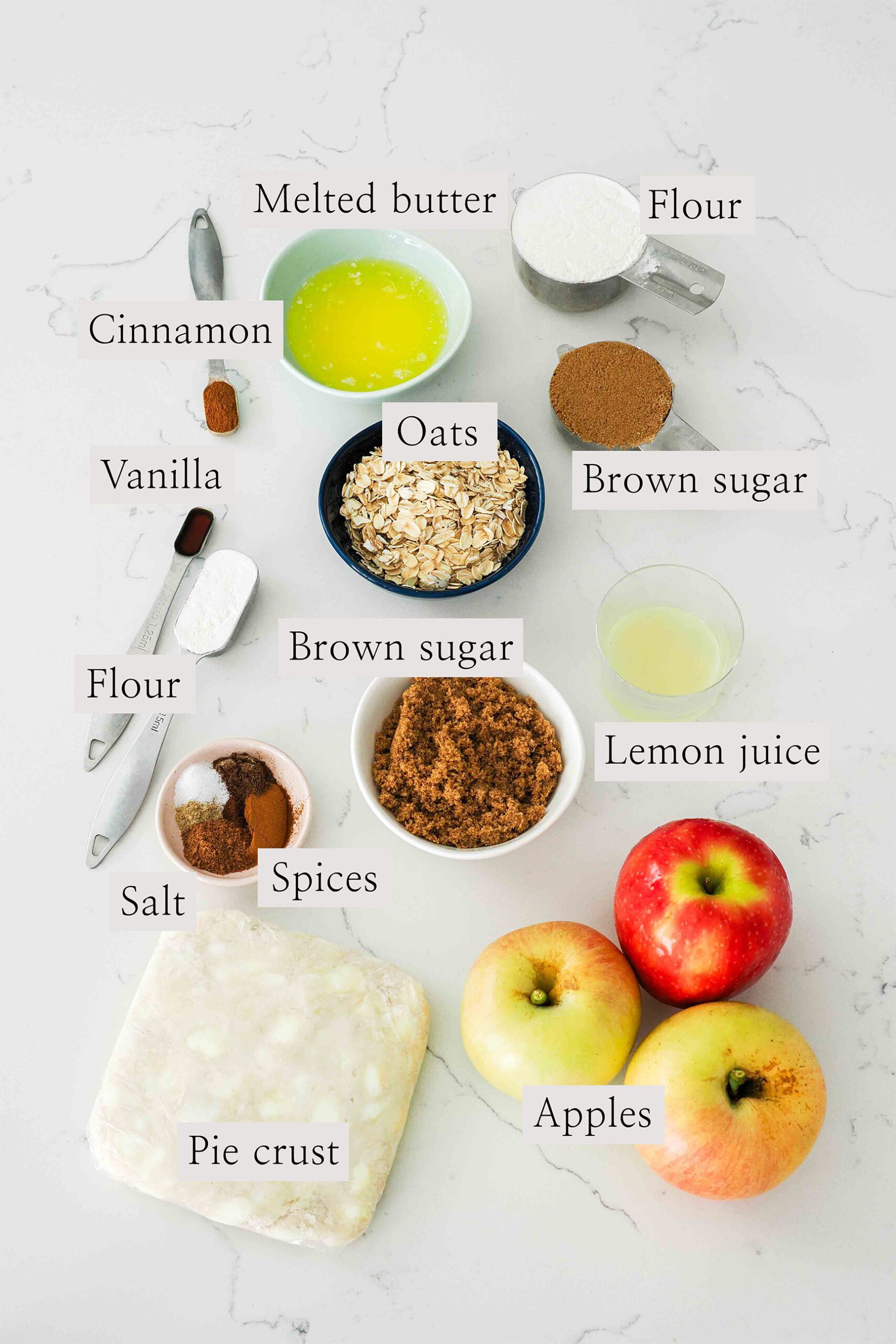 Ingredients for mini Dutch apple pies on a counter.